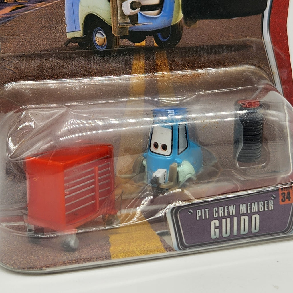 Disney Pixar World of Cars 2009 PIT CREW MEMBER Guido #34 NEW 1:55 Diecast1