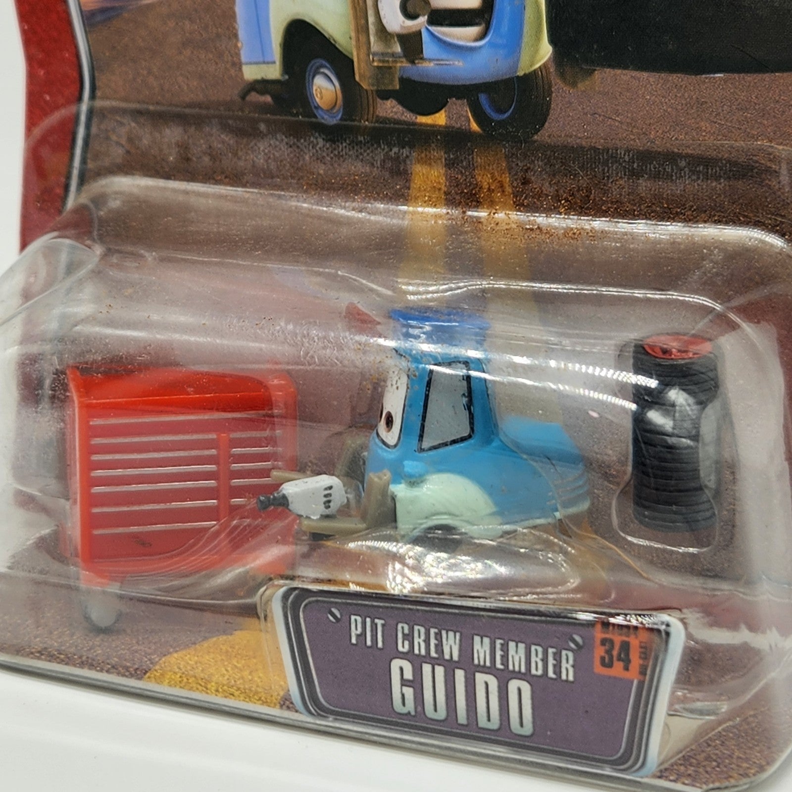 Disney Pixar World of Cars 2009 PIT CREW MEMBER Guido #34 NEW 1:55 Diecast2