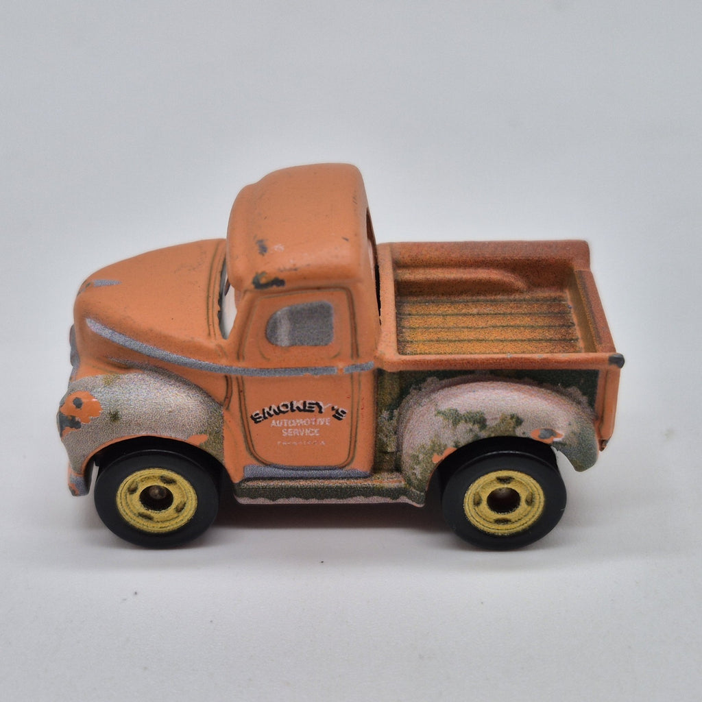 USED Smokey Disney Pixar Cars Mini Racers 1:87 Diecast Truck1