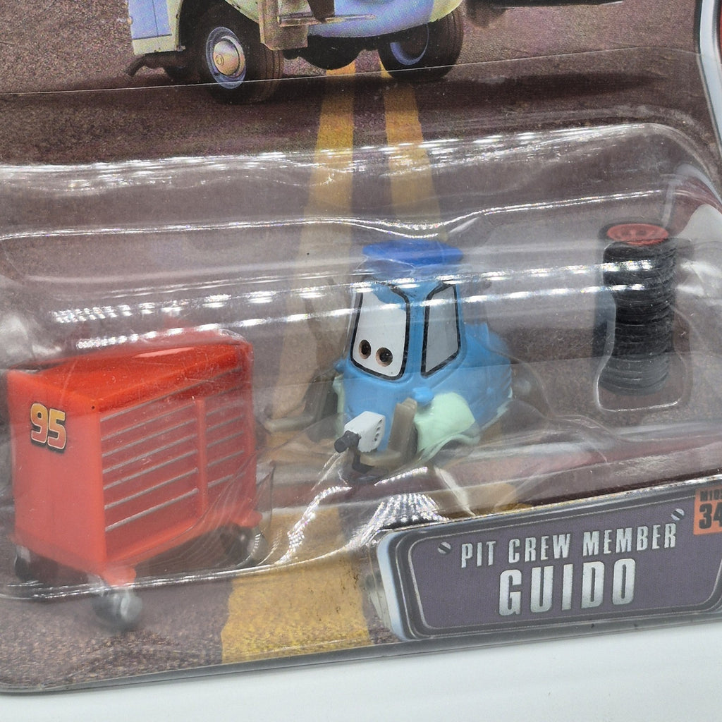 Disney Pixar Cars Pit Crew Member Guido #34 The World of Cars New Die-Cast 1:551